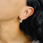 Load image into Gallery viewer, Close-up of an ear wearing a pearl earring with dark hair and skin.
