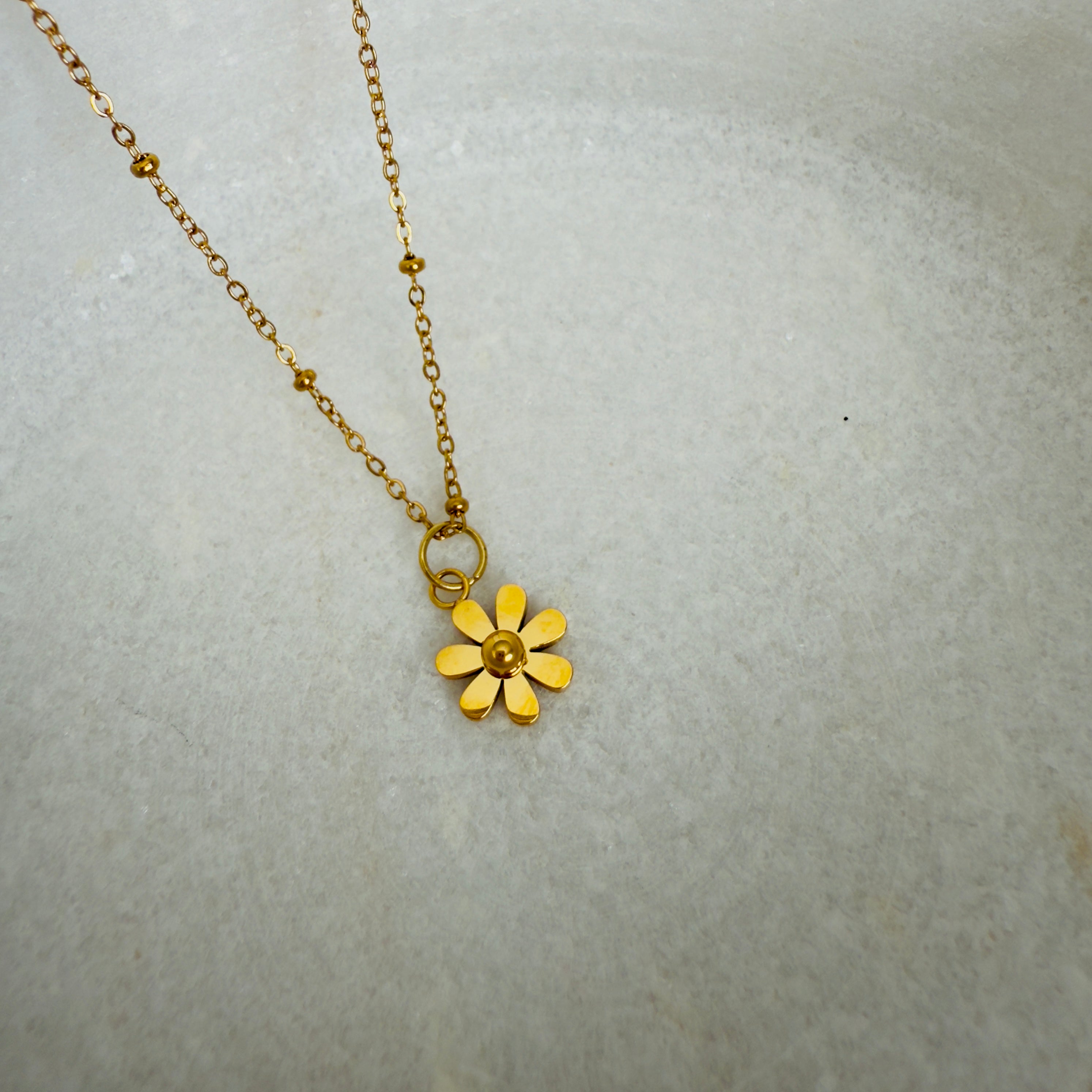Daisy charm in a ball chain