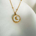 Load image into Gallery viewer, Gold plated Stainless steel necklace with a round white enamel moon pendant

