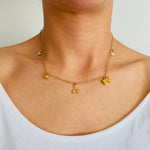 Load image into Gallery viewer, Personalised charm necklace in gold worn by a women
